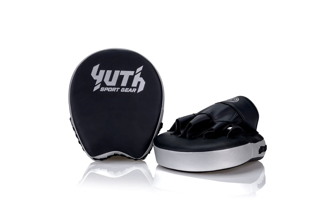 A collection of boxing and Muay Thai equipment including gloves, punching bag, and hand wrap made in Thailand, top bands such as Fightworld, Yuth, Danger, WBC, BKFC, Shinguards, Muay Thai, MMA Shorts and Equipments.