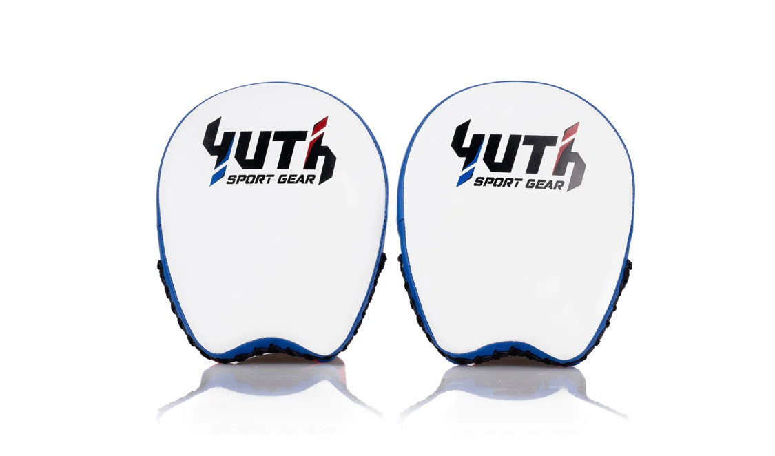 A collection of boxing and Muay Thai equipment including gloves, punching bag, and hand wrap made in Thailand, top bands such as Fightworld, Yuth, Danger, WBC, BKFC, Shinguards, Muay Thai, MMA Shorts and Equipments.