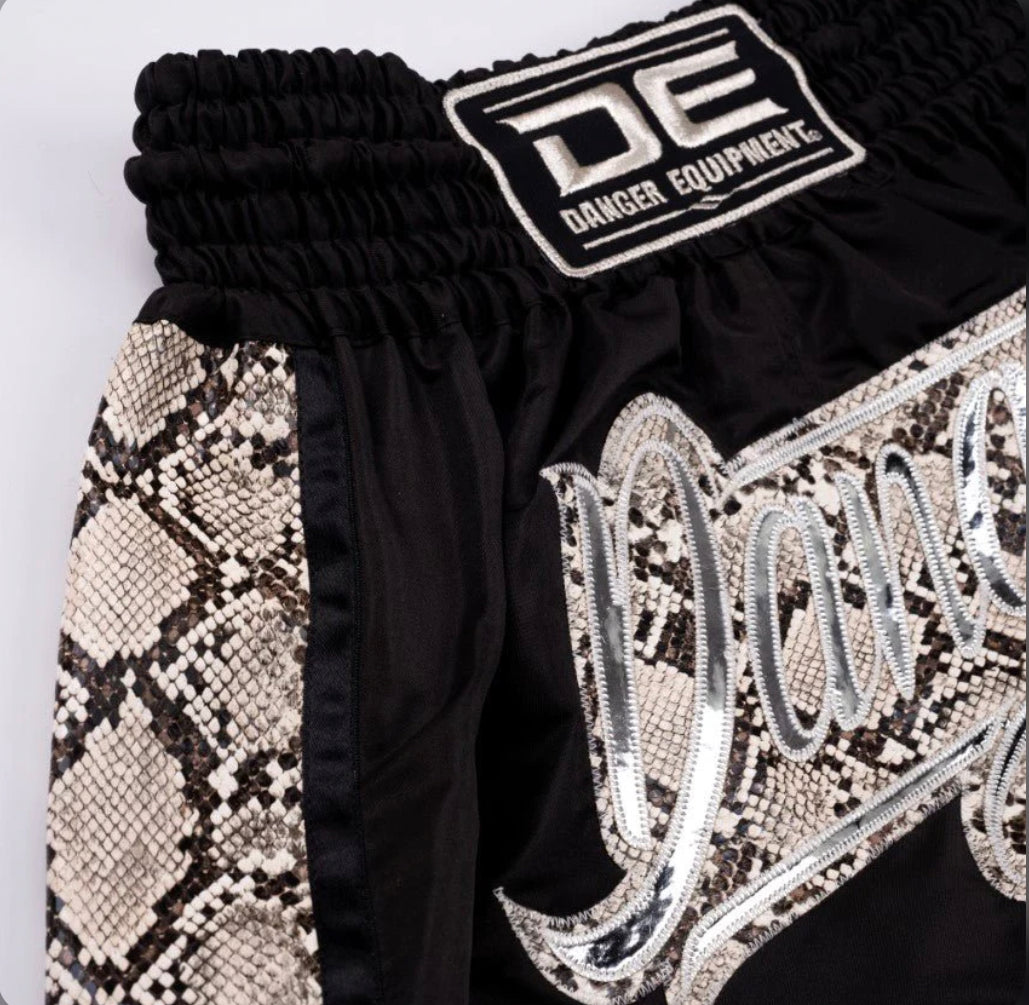 A collection of boxing and Muay Thai equipment including gloves, punching bag, and hand wrap made in Thailand, top bands such as Fightworld, Yuth, Danger, WBC, BKFC, Shinguards, Muay Thai, MMA Shorts and Equipments.
