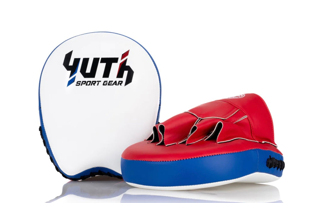 A collection of boxing and Muay Thai equipment including gloves, punching bag, and hand wrap made in Thailand, top bands such as Fightworld, Yuth, Danger, WBC, BKFC, Shinguards, Muay Thai, MMA Shorts and Equipments.