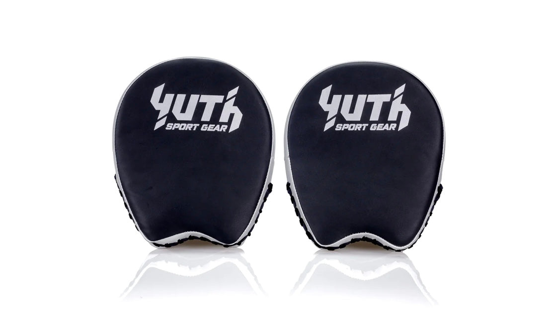 A collection of boxing and Muay Thai equipment including gloves, punching bag, and hand wrap made in Thailand, top bands such as Fightworld, Yuth, Danger, WBC, BKFC, Shinguards, Muay Thai, MMA Shorts and Equipments.