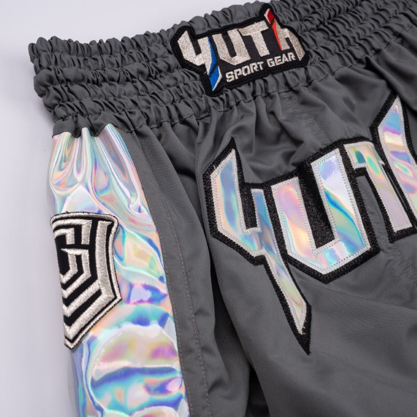 A collection of boxing and Muay Thai equipment including gloves, punching bag, and hand wrap made in Thailand, top bands such as Fightworld, Yuth, Danger, WBC, BKFC, Shinguards, Muay Thai, MMA Shorts and Equipments.