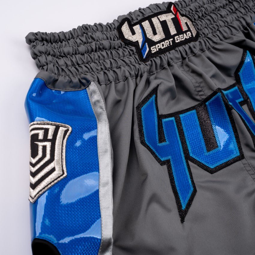 A collection of boxing and Muay Thai equipment including gloves, punching bag, and hand wrap made in Thailand, top bands such as Fightworld, Yuth, Danger, WBC, BKFC, Shinguards, Muay Thai, MMA Shorts and Equipments.